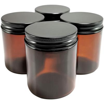 China Home decoration amber glass jar with black metal lid, perfect for candy holders, DIY candle and storage for sale