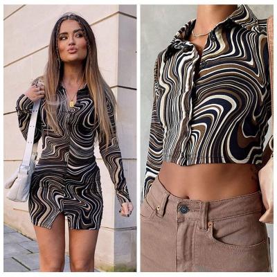 China New style ripple anti-static printing water swirl polo collar breasted sexy slim slit dress top for sale