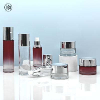 China 30g 50g 40ml 100ml 120ml luxury high end cosmetic packaging set red frosted color glass cream jars and toner lotion celar bottle for sale