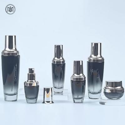 China OEM 15g 20g 30g 50g 20ml 30ml 50ml 100ml 120ml black cosmetic gradient lotion glass bottle and jar skin care cream packaging set for sale