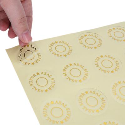 China Waterproof Self Adhesive Sticker Label , Custom Printing Clear Transparent PVC Gold Foil Packaging Labels for sale