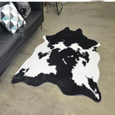 China Nordic Style Artificial Modern Cow Blanket And Rug Blankets /living Room Washable Blankets for sale