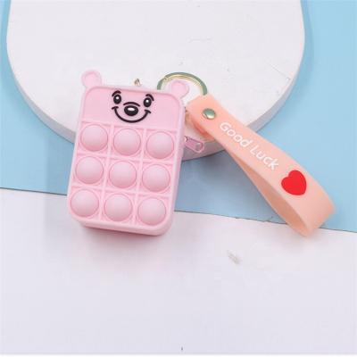 China Wholesale Custom Pink Squeezable Relieve Link Dye Toys Kids Toy Advent Calendar Mini Silicone Coin Purse for sale