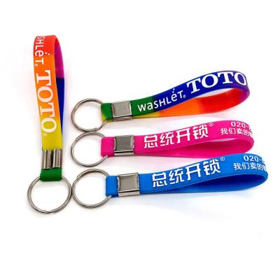 China Souvenir Gifts Promotion Silicone Wristband Key Chain With Metal Buckle Hand Hold Key Ring Key Holder Silicone Bangle for sale