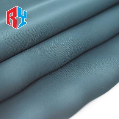 China Free Sample Hot Selling Simple Green Fusible Bengal Polyester Nida Abaya Fabric for sale