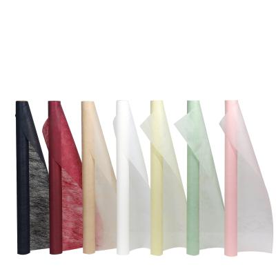 China Hot Sale Cotton Waterproof Paper Liner Backing Waterproof Nonwoven Kraft Paper Flower Wrapped Paper for sale