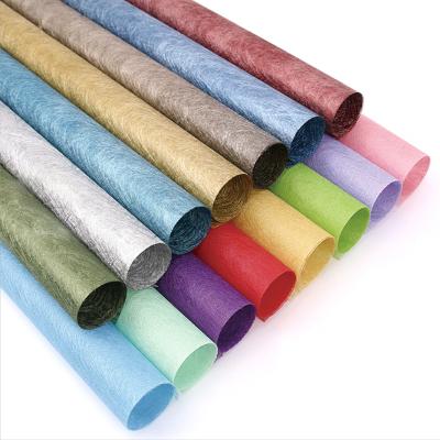 China High Quality Waterproof Nonwoven Flower Bouquet Wrapping Tissue Paper Nonwoven Fabric Small Roll For Christmas Gift Wrapping Paper for sale