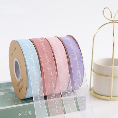 China Hengcool 2.5cm English Letter Printed Viable Hot Selling Gift Wrapping Yarn Silk Ribbon for sale