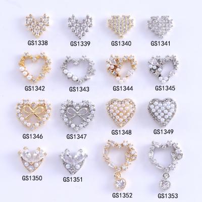 China 2021 New Trendy Rhinestone Pearl Heart Nail Art Decoration Starfish Shell Bow For Nails 3D Nail Charms for sale