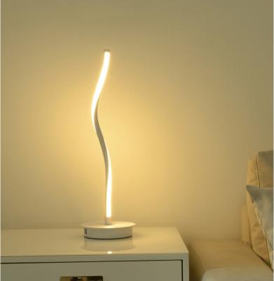 China Modern Contemporary Remote Control Smart Dimmable LED Table Lamp Curved Warm White LED Desk Lamp Light for sale