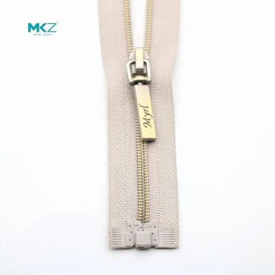 China High quality MKZ 5#8# waterproof nylon plastic zipper puller for sports clothes and coat zipper puller for sale