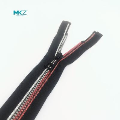 China Viable Customizable Plastic MKZ Resin Zipper Contrast Color Black Zipper For Jacket for sale