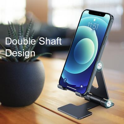 China Universal Non-slip Metal Phone Tablet Phone Holder Foldable Adjustable Adjustable Multi-Purpose Silicone Desk Stand for sale