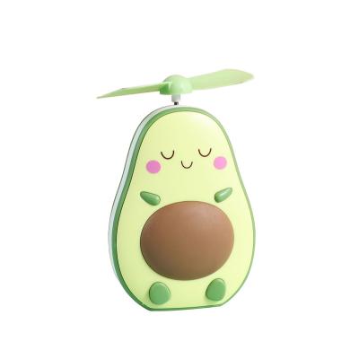 China Hotel Night Light Cute Buzz Fruit Led Avocado Mini Fan With Mirror for sale