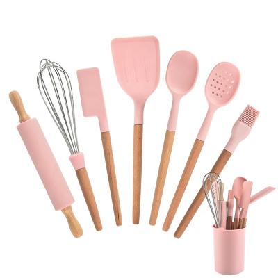 China Stocked Kitchen Cooking Pink Silicone Utensils Cake Baking Set With Wooden Handles And Rolling Pin And Egg Whisk for sale