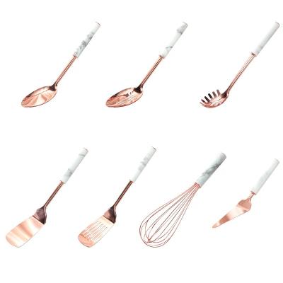 China Sustainable Kitchen Rose Gold Color Stainless Steel Cookware And Storage Rack Set With Marble Grain Handle for sale