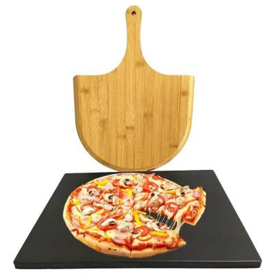 China Sustainable Kitchen Baking Rectangular Black Cordierite Pizza Stone And Bamboo Wood Pizza Skin Paddle Set For Oven And Grill for sale