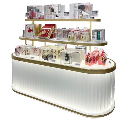 China Creative Multi Level Acrylic Cosmetic Display Cabinet Oval Glowing Shop Display Shelf for sale