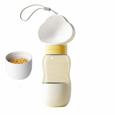 China Hot Selling Multifunctional Automatic No Puddle Drink Feeder Portable 4 in 1 Dog Travel Water Bottle with Food Container for sale