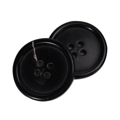 China Washable Ready To Ship Fashion Color Natural Black Hand Leg Horn 4-Holes Sewing Button For Suit Or Sweater for sale