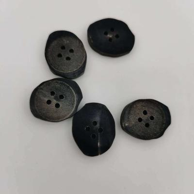 China Washable Ready To Ship Retro Fashion Style Horn 4 Holes Black Sewing Button For Finished Coat Or Sweater for sale