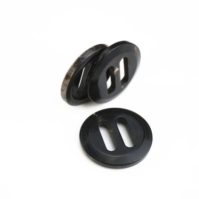 China Washable Ready To Ship Fashion Buckle Leg Black Horn Button For Finished Coat Or Sweater for sale