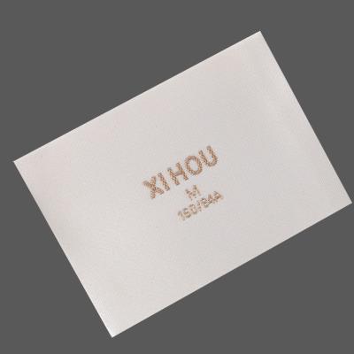 China Luxury Design Rectangle Fabric Washable Luxury Soft Cotton Woven Label Garment Key Label for sale