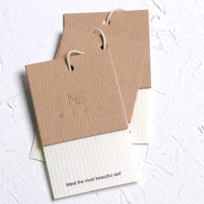 China Sustainable Paper Hang Tag Wholesale , Custom Design Recycled Paper Clothing Tag for sale