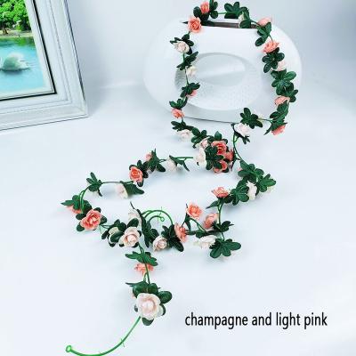 China Hot Selling Linear Artificial Silk Rose Vine Hanging Flowers Garland for Wedding Decor for sale