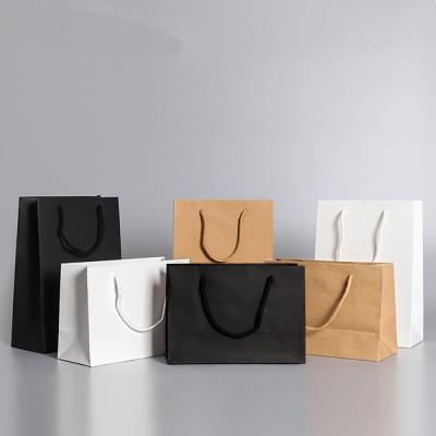 China Recyclable Wholesale Custom Logo Paper Tote Bag Catering Brown Kraft Paper Shopping Bag With Handle for sale