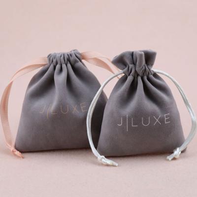 China Eco-Friendly Bag Sale Online Jewelry Pouch Custom Embossed Logo Printed Velvet Drawstring Bag for sale