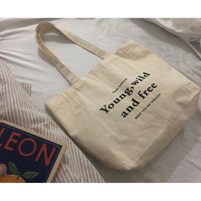 China Large Empty White Color Canvas Cotton Shopping Bag Beach Cotton Tote Bag Eco-friendly for sale