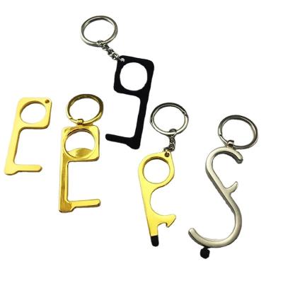 China Carry Multi Function Tool Hygiene EDC No Touch Hand Door Bottle Opener Key Chain for sale