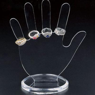 China 2023 Eco-friendly New Design Hand Shape Ring Jewelry Display Rack Holder Clear Acrylic for sale