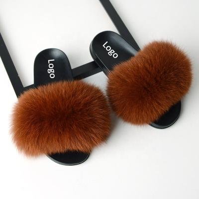 China Unique Real Fox Fur Fashion Trend Ladies PVC Fur Slippers Custom Handmade Natural Raccoon Fluffy Slides For Women for sale