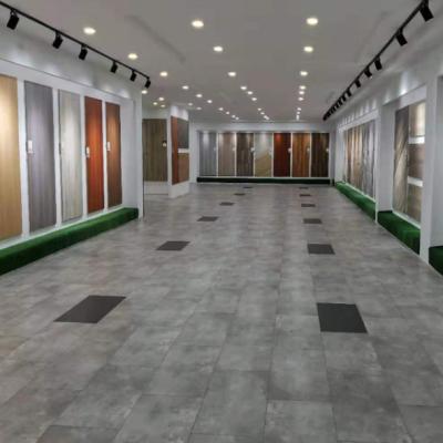 China Newest version pvc piso core floating piso core flooring waterproof SPC flooring waterproof wear resistant luxury rigid vinyl plank for sale