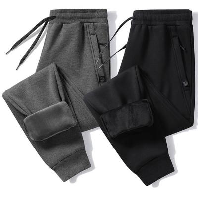 China Anti-wrinkle good quality men's gym drop winter sports loose pants with fleece bound feet casual trousers for sale