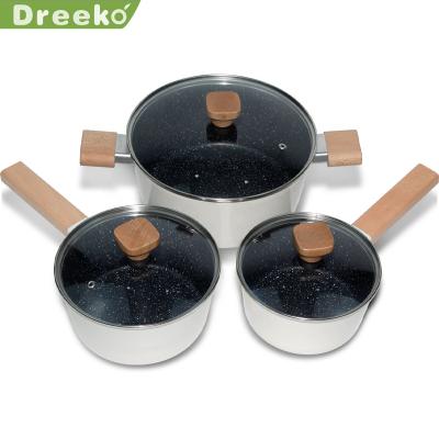 China Sustainable 3 Pieces White Pressed Nonstick Cooking Pots Set Aluminum Wooden Handle Casserole Lid for sale