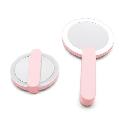 China Newest Design Fashion Hand Held Lighted Hand Mirror Pocket Makeup Cosmetic Portable Led Mirror for sale