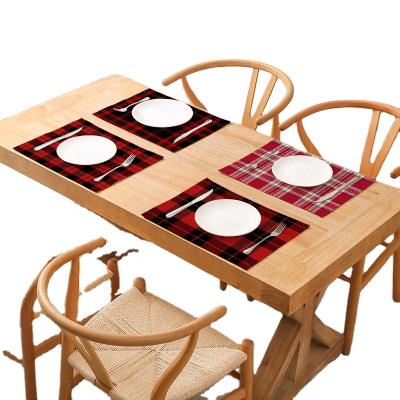 China Hotel and Resort Series Fashionable Check Printed Heat Insulation Anti-Slip Cotton Linen Kitchen Christmas Border Dining Table Mat for sale