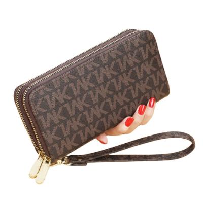 China New Style Anti Theft RFID Blocking Large Capacity Clutch Purse Women Leather Wallet With Wrist Strap for sale