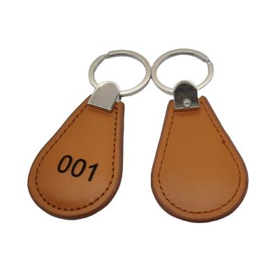 China Custom Smart 13.56MHZ Key Chain Leather Key Subway Card RFID Tag FOB RFID Keyfob Logo Printing for sale