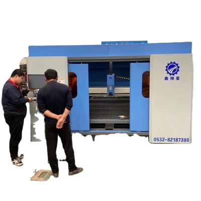 China GXJH 3015-4000 W Automatic Laser Water Cooled Cutting Machine High Efficient for sale