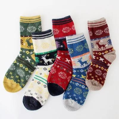 China Woolen winter thongs women's mid-tube socks cartoon to keep warm wind rabbit woolen socks ethhic women for sale