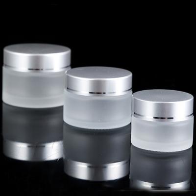 China Skin Care Cosmetics Cosmetics Containers And Packaging Round Scrubs Cosmetic Jars With Lids for sale