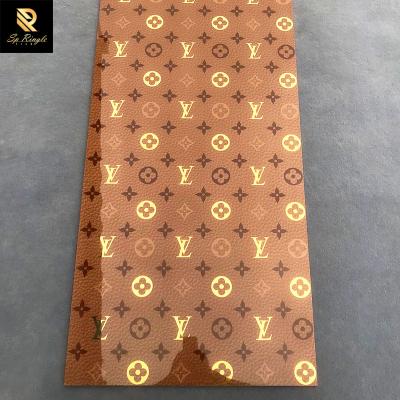 China Fashional Style Springletile ISO Approved Letter Symbol 3d High Quality Brick Tiles Golden Brown Flower Polished Ceramic Tiles for sale