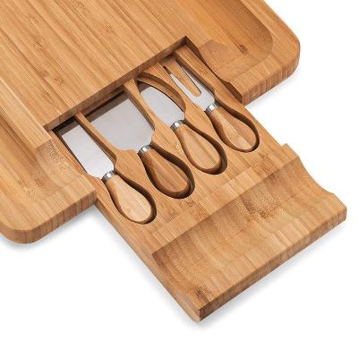 China Sustainable Organic Bamboo Cheese Board With Knife Set Bamboo Serving Tray With Cutlery For Sale for sale