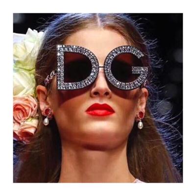 China Unique Irregular Rimless Sunglasses Diamond Rhinestone Women Sunglasses Fashion Sun Glasses Design for sale