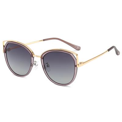 China New Fashion Sunglasses Fashion Sale Metal Polarized Cateye 2022 Women's Sunglasses Hollowed-out Mirrored Lenses Cat Eyes Sunglasses for sale