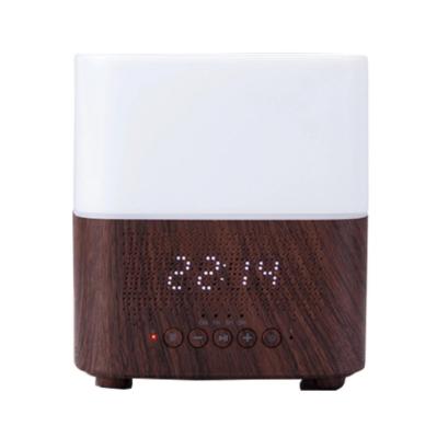 China Color Changing Ambient Light Ultrasonic Wood Grain Diffuser 2022 LED Light Humidifier Clock Aroma Diffuser Audio Alarm Clock New for sale